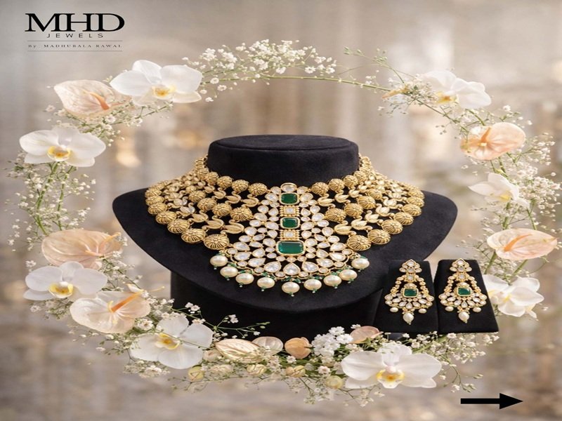 Elegant gold-tone necklace and matching earrings with green stones